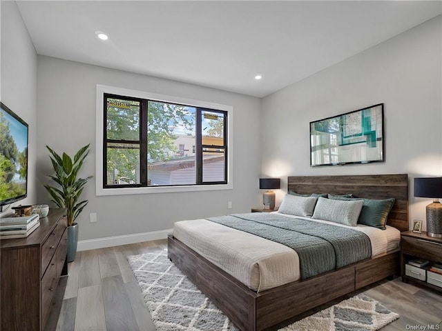 bedroom featuring light hardwood / wood-style flooring