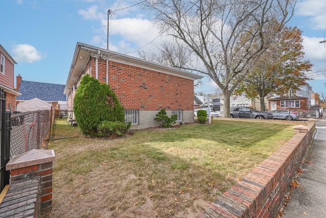 view of property exterior with a yard