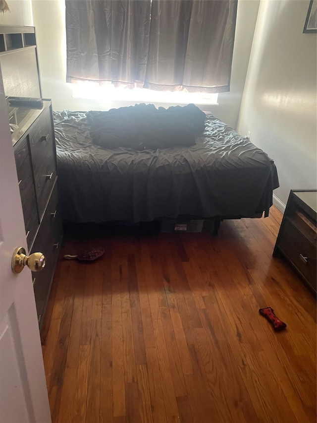 bedroom featuring hardwood / wood-style flooring