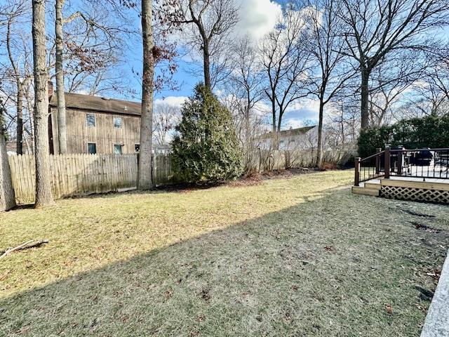 view of yard with a deck