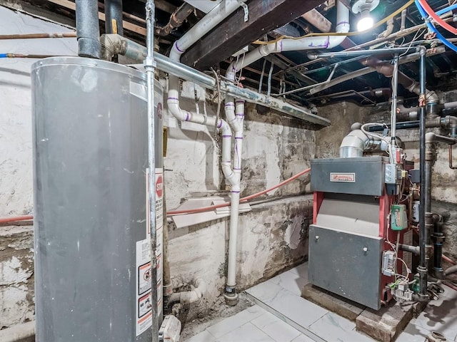 utility room featuring gas water heater