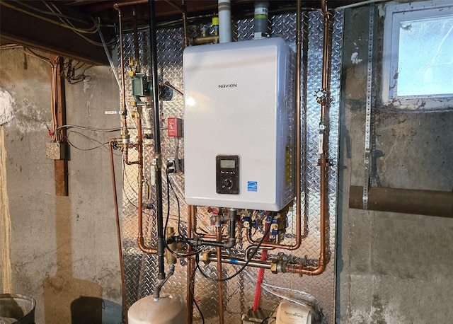 utility room with water heater