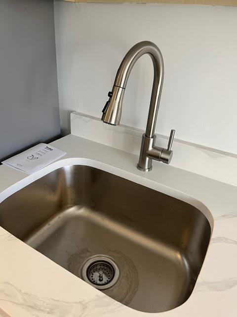 interior details featuring sink