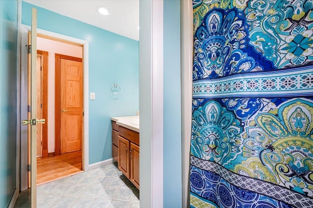 bathroom with vanity and tile patterned floors