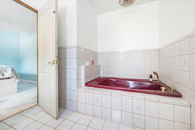 bathroom featuring a relaxing tiled tub