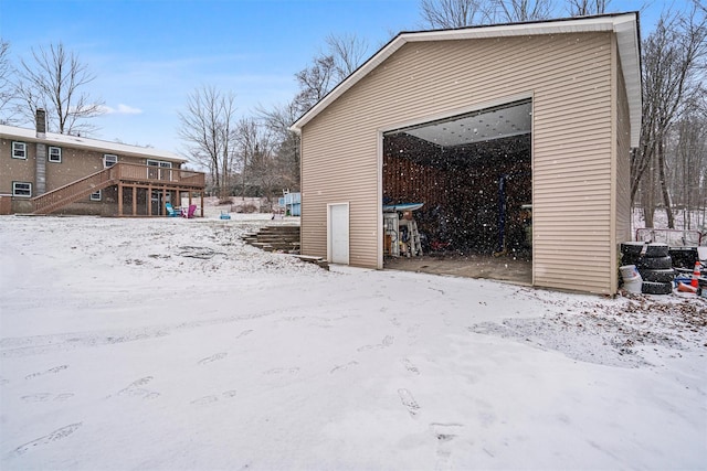 view of snow covered garage