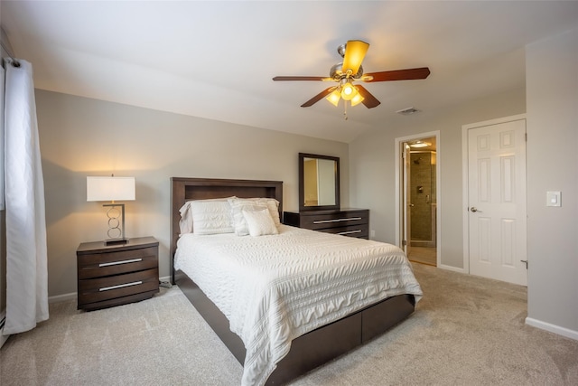 bedroom with a ceiling fan, carpet, visible vents, baseboards, and ensuite bathroom