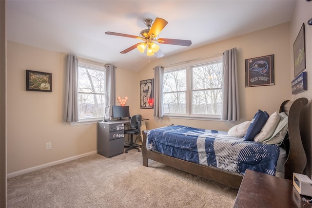 bedroom with lofted ceiling, carpet, baseboards, and ceiling fan