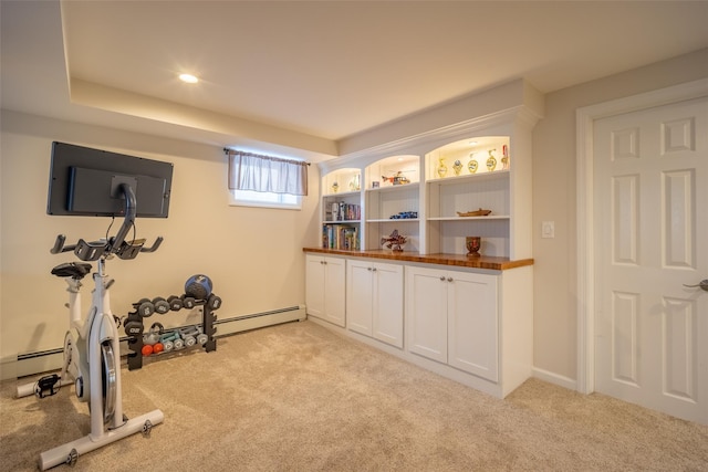 workout room featuring recessed lighting and light carpet