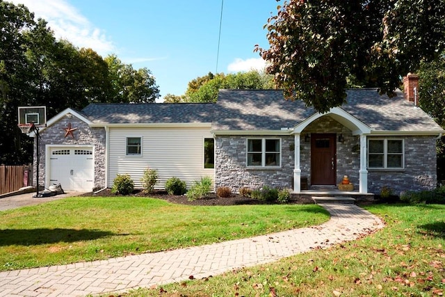 ranch-style home with stone siding, a front yard, an attached garage, and a chimney