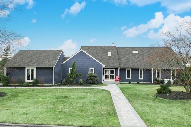 view of front of home with a front lawn