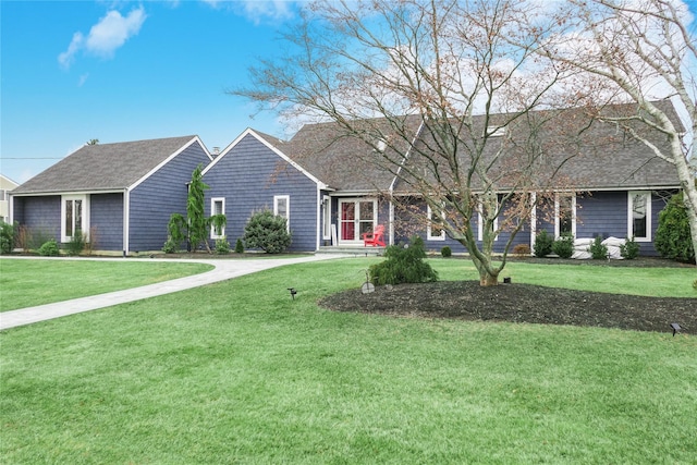 view of front of home featuring a front lawn