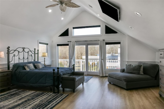 bedroom with ceiling fan, access to outside, high vaulted ceiling, and light hardwood / wood-style flooring