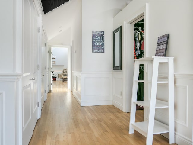 corridor featuring light hardwood / wood-style floors