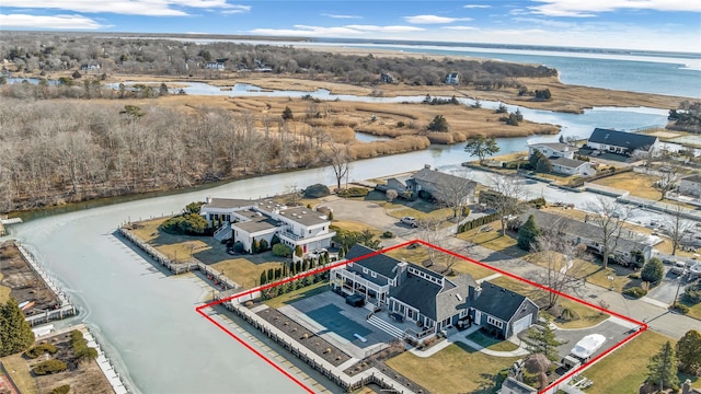 birds eye view of property featuring a water view