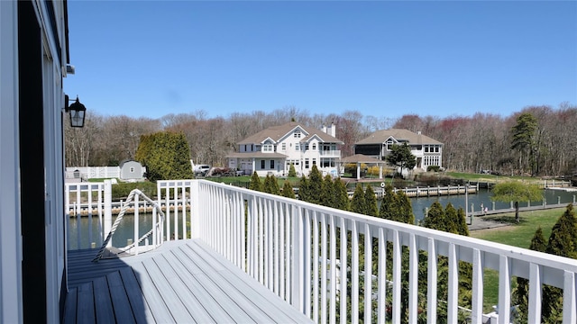 deck featuring a water view