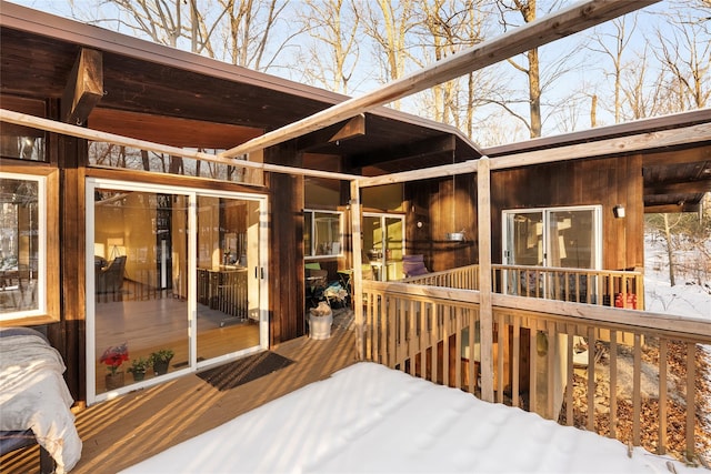 view of snow covered deck