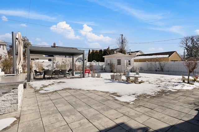 view of patio / terrace with an outbuilding and sink