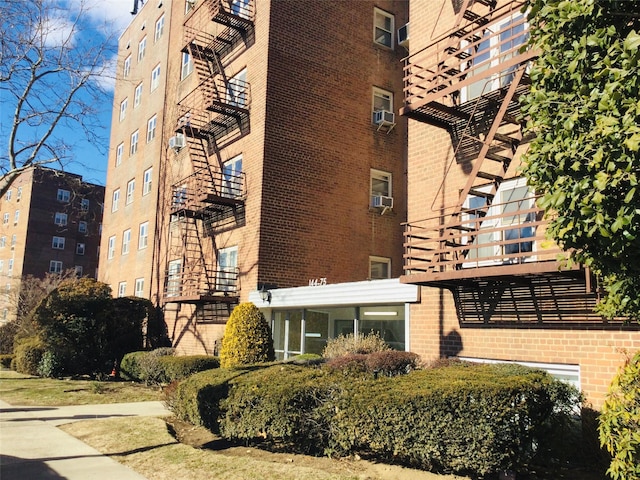 view of building exterior with cooling unit