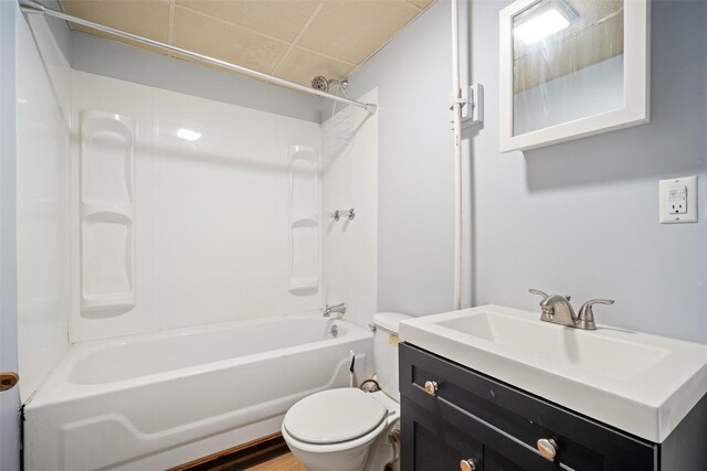 full bathroom featuring vanity, shower / washtub combination, and toilet