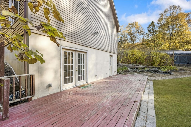 wooden terrace featuring french doors