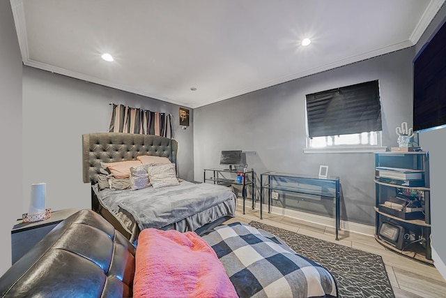 bedroom with ornamental molding and light hardwood / wood-style flooring