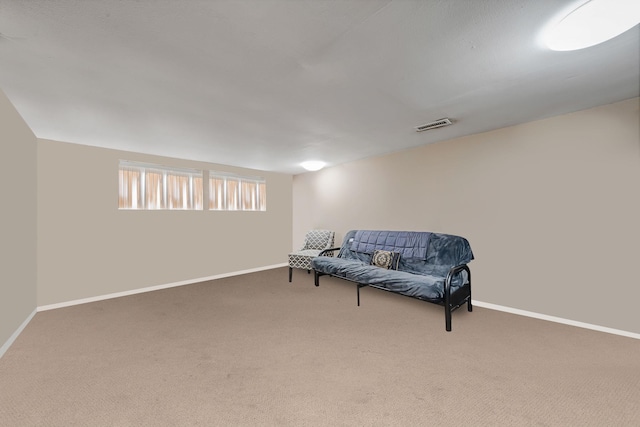 living area with carpet flooring