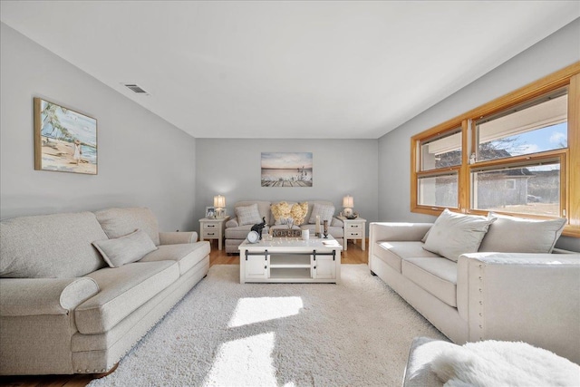 living room with light hardwood / wood-style floors