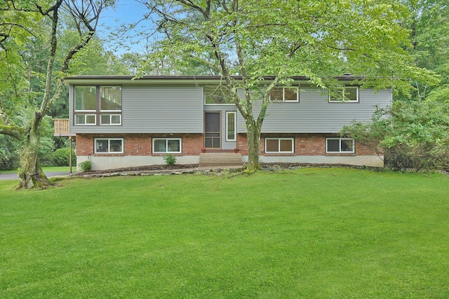 3 Dore Ct, New City, NY 10956 - view of front of house featuring a front lawn, brick siding, and entry steps
