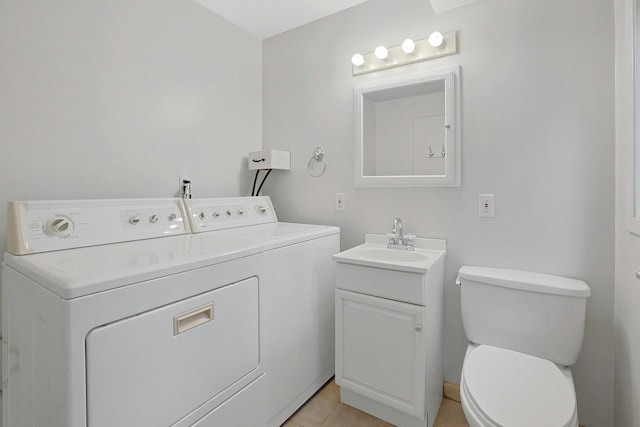 3 Dore Ct, New City, NY 10956 - bathroom featuring washer and dryer, vanity, and tile patterned flooring
