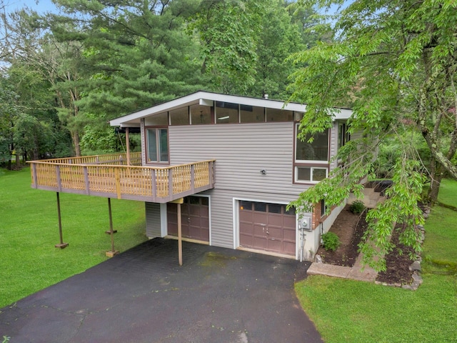 3 Dore Ct, New City, NY 10956 - view of front of house with driveway, an attached garage, a front yard, and a deck