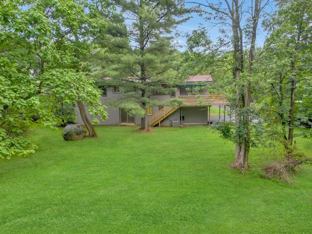 3 Dore Ct, New City, NY 10956 - view of green lawn with stairs and a wooden deck