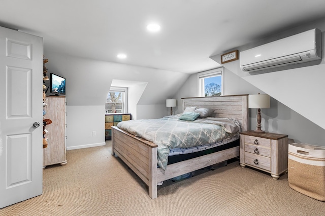 carpeted bedroom featuring vaulted ceiling and a wall unit AC