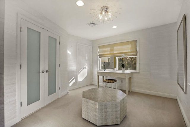 interior space featuring a notable chandelier, recessed lighting, visible vents, light carpet, and baseboards