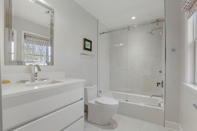 full bathroom with enclosed tub / shower combo, vanity, toilet, and tile patterned floors