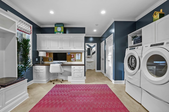 laundry area featuring light tile patterned floors, washer and clothes dryer, recessed lighting, and crown molding