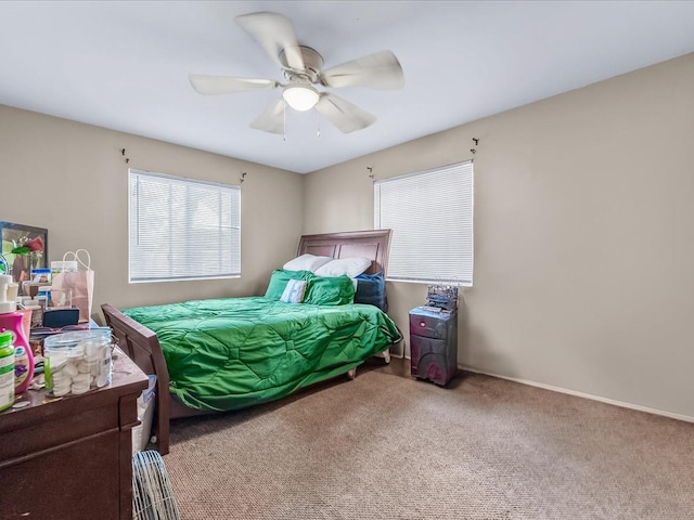 bedroom featuring ceiling fan and carpet floors