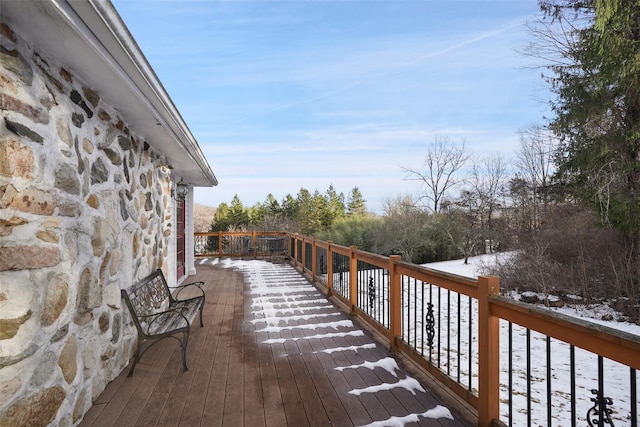 view of snow covered deck