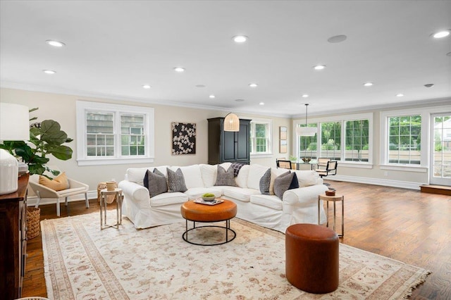 4 Clover Pl, New Rochelle, NY 10805 - living area featuring ornamental molding, baseboards, recessed lighting, and wood finished floors