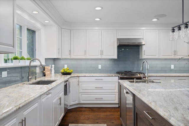 4 Clover Pl, New Rochelle, NY 10805 - kitchen featuring range hood, a sink, white cabinets, tasteful backsplash, and recessed lighting