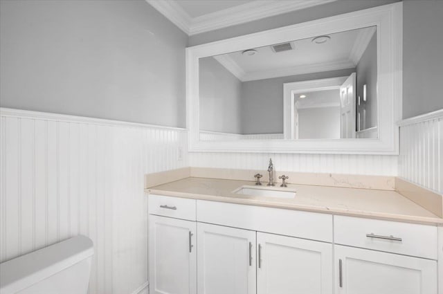 4 Clover Pl, New Rochelle, NY 10805 - half bath with vanity, toilet, a wainscoted wall, and ornamental molding