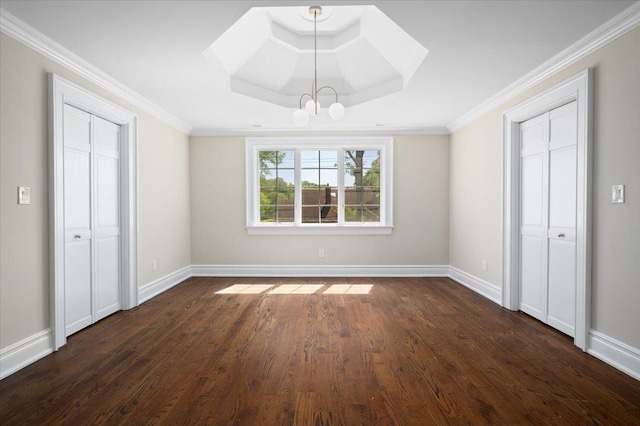 4 Clover Pl, New Rochelle, NY 10805 - unfurnished bedroom with dark wood-type flooring, a chandelier, baseboards, and ornamental molding