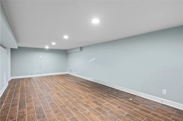 4 Clover Pl, New Rochelle, NY 10805 - finished below grade area with recessed lighting, dark wood-style flooring, and baseboards