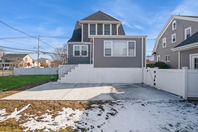 view of snow covered house