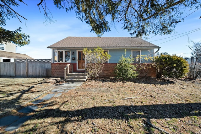 view of front of home with a front lawn