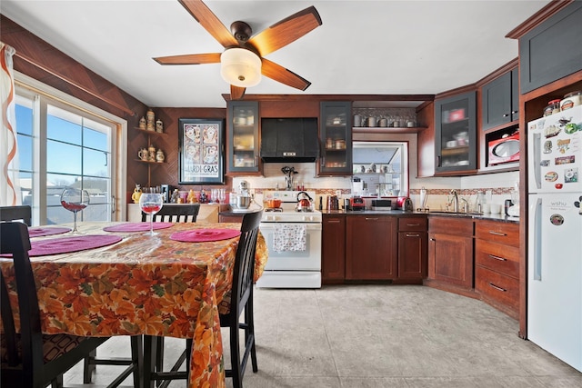 kitchen with ceiling fan, sink, exhaust hood, and white appliances