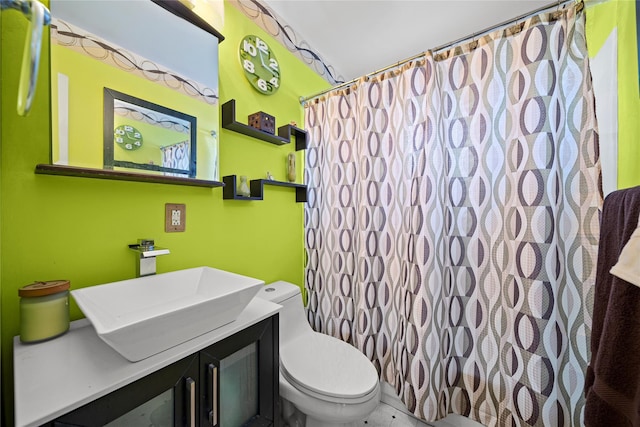 bathroom with a shower with curtain, vanity, and toilet