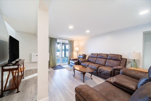 living room with light hardwood / wood-style floors