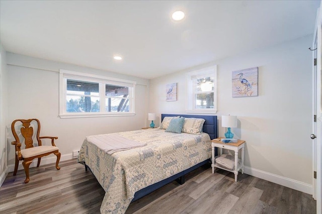 bedroom with hardwood / wood-style flooring