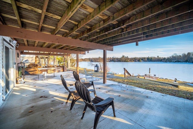 view of patio / terrace featuring a water view